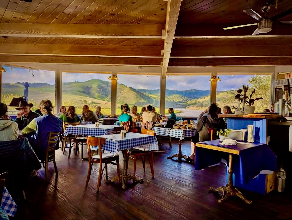 Interior view of Jilly's, with patrons happily enjoying their meals